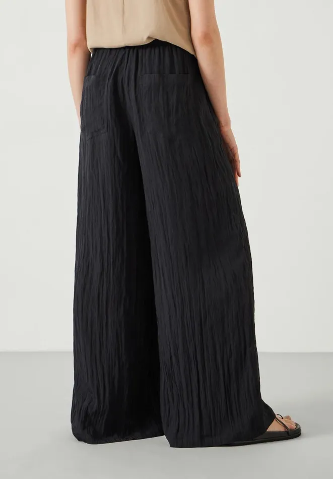 Hush Trousers Women Mabel Fluid Wide Leg Crinkle Trousers Black Hush Trousers Women Mabel Fluid Wide Leg Crinkle Trousers Black